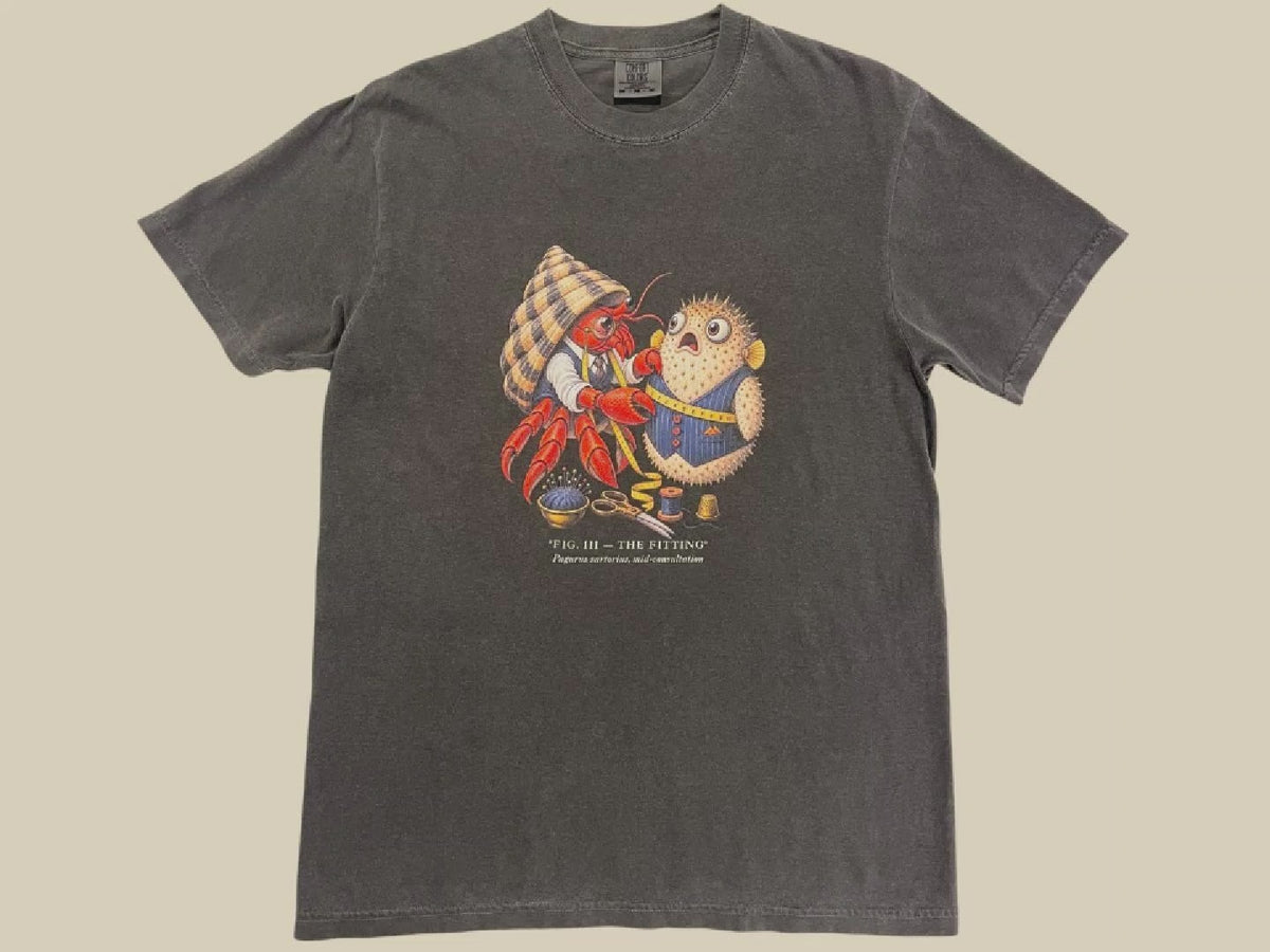 Load video: Close-up of Unnatural Fauna Club Comfort Colors T-shirt showing fabric, neckline, print quality and on-body fit